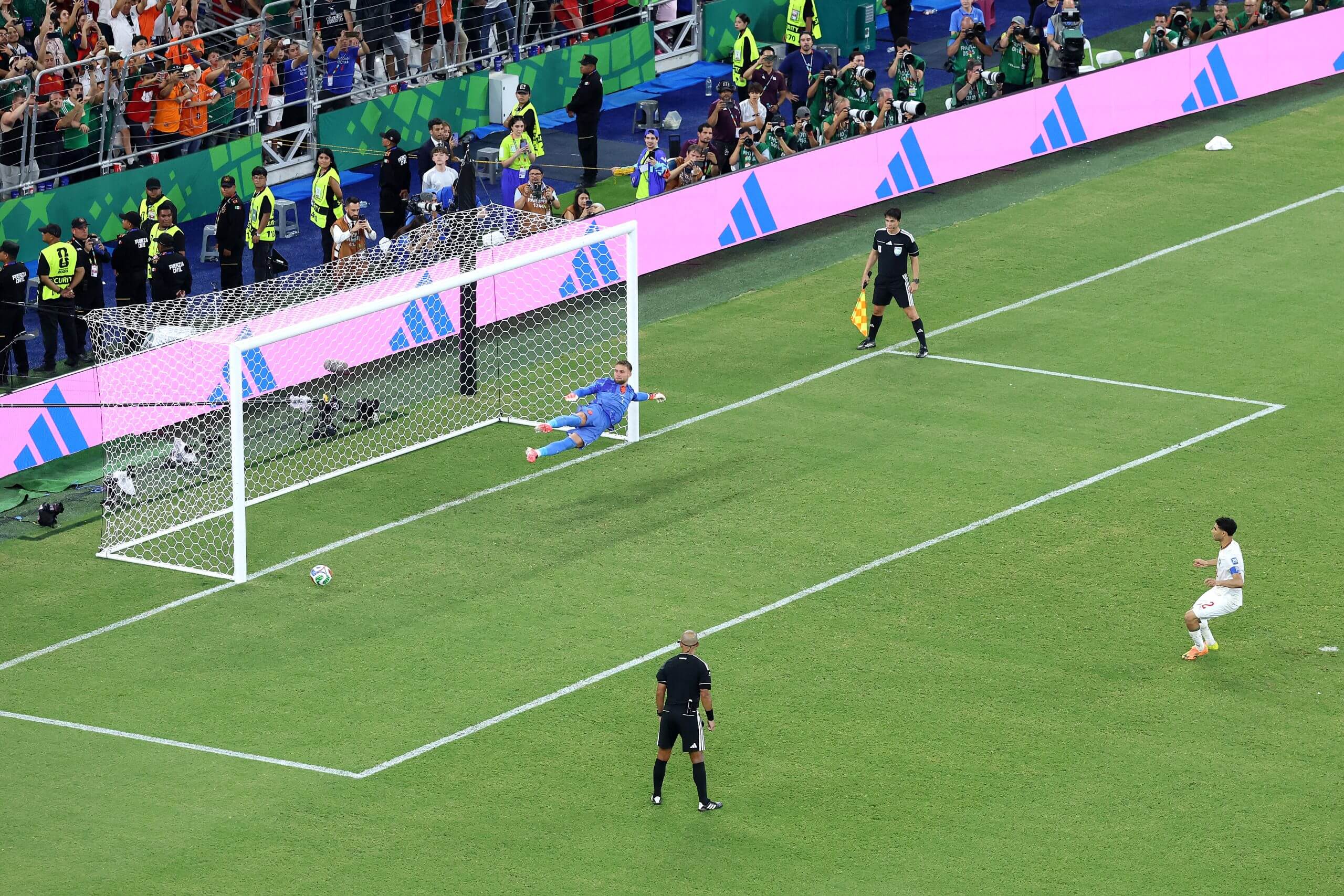The moment just before Hakimi's effort hits the post