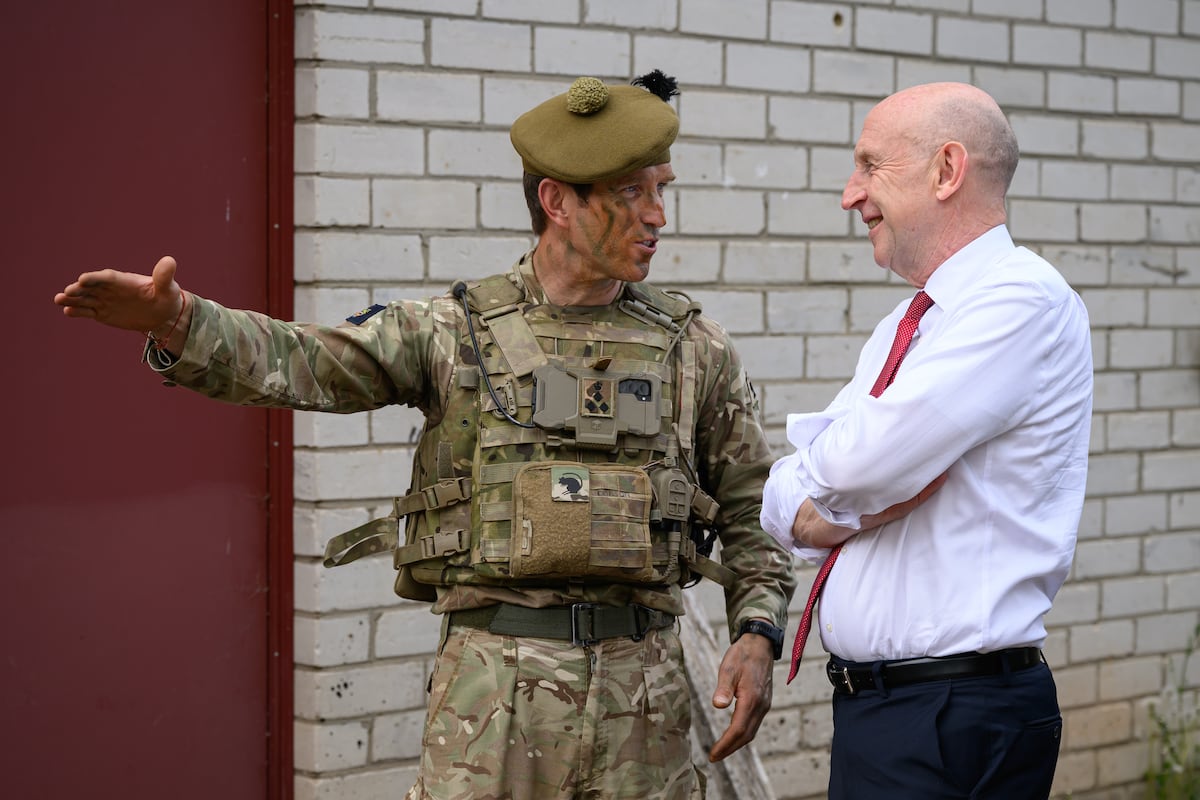 UK defense secretary resigns in protest of government spending plan