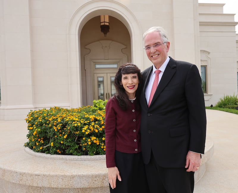 Elder Neil L. Andersen of the Quorum of the Twelve Apostles and his wife, Sister Kathy Andersen, pose for a photo outside the Bacolod Philippines Temple in Bacolod City, Philippines, on Saturday, May 30, 2026.