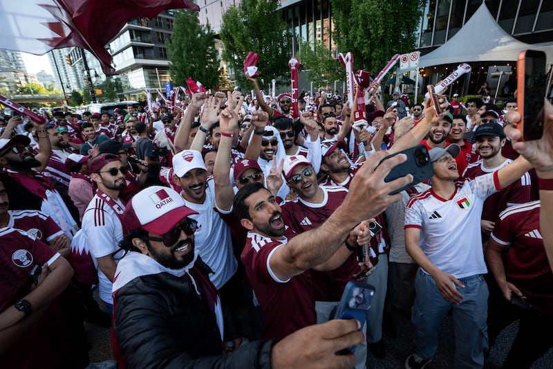 Qatar fans march