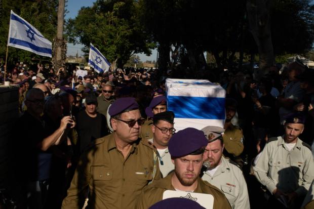 Israeli soldiers carry the coffin of Staff-Sergeant Michael Tyukin.