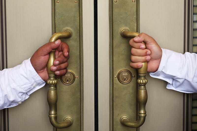 Ushers hold the temple door handles prior to the Bacolod Philippines Temple dedication in Bacolod City, Philippines, on Sunday, May 31, 2026.