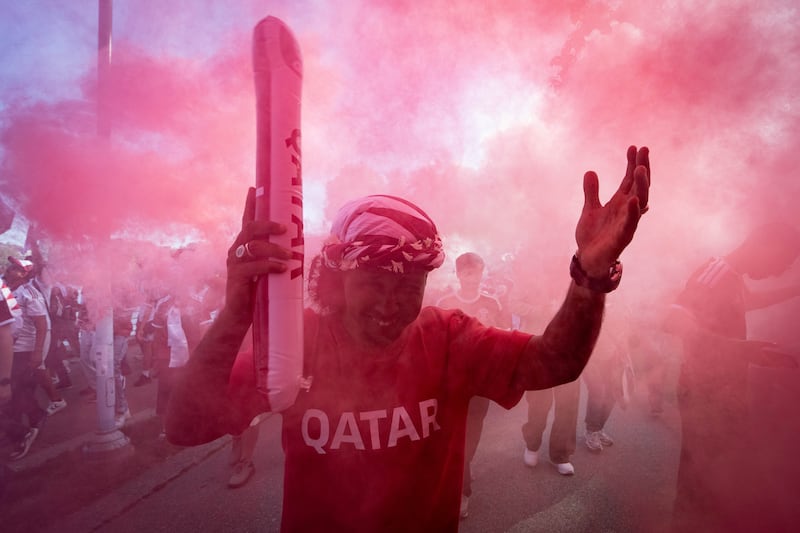 Qatar fans march