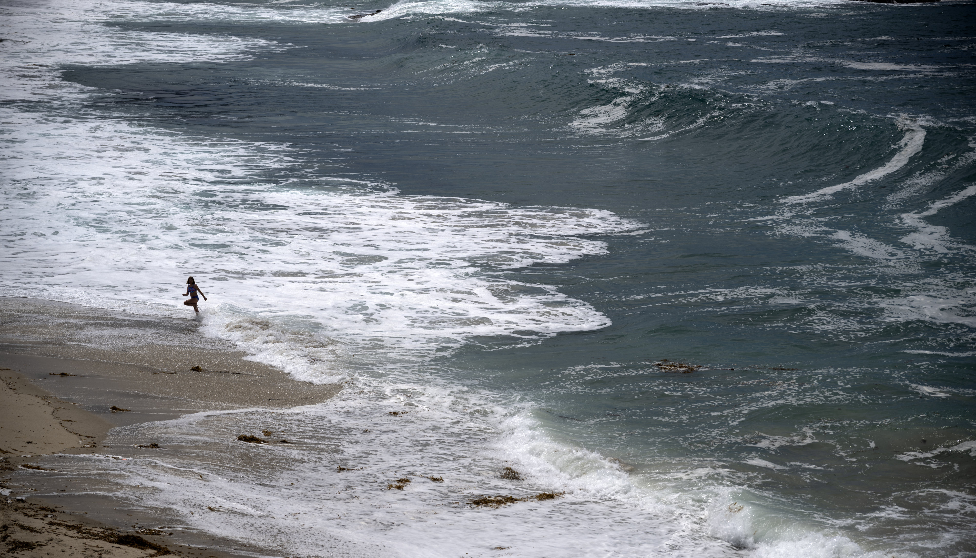 Lifeguards were kept busy in Laguna Beach on Wednesday, June...