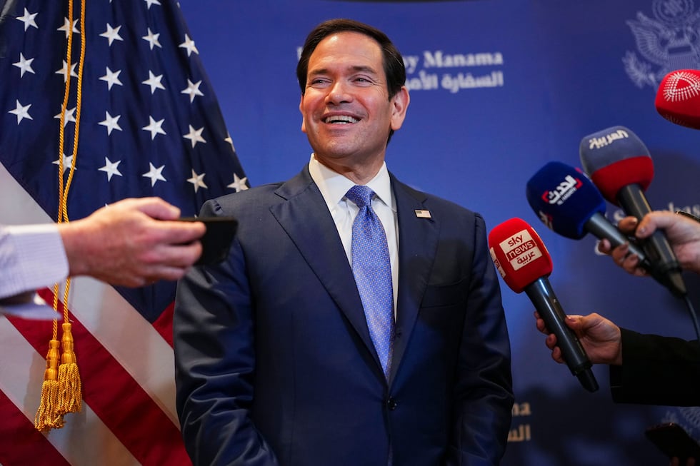 U.S. Secretary of State Marco Rubio speaks with members of the media before departing for...