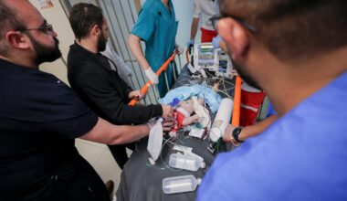 Palestinian medical workers surround a wounded baby on a stretcher at a hospital in Hebron in the occupied West Bank, on June 5, 2026. A seven-month-old baby was critically wounded and his parents were injured during an Israeli military operation in the Wadi al-Hariya area.