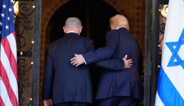 FILE - President Trump and Israel's Prime Minister Benjamin Netanyahu walk into Trump's Mar-a-Lago club, on Dec. 29, 2025, in Palm Beach, Fla., after an arrival greeting.