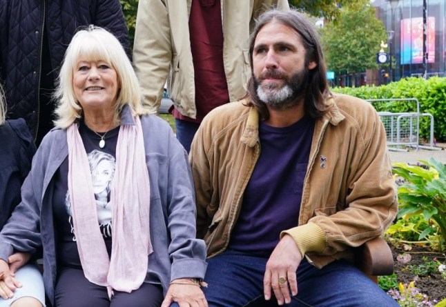(Back left to right) Michelle hazard, Micky Hazard and Sonny Millington Flack (front left to right) Liz Gracie holding Lottie the dog, Jody Flack, Christine Flack and Paul Flack at the unveiling a suicide prevention bench in memory of Caroline Flack installed by the Legend on the Bench charity at the Tottenham Community Sports Centre in north London. Caroline took her own life at the age of 40 on February 15 2020. Picture date: Friday September 27, 2024.