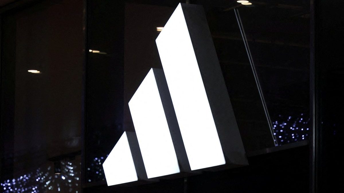 FILE PHOTO: Logo of Adidas brand is displayed on the store in the center of Warsaw, Poland, January 4, 2024. REUTERS/Kacper Pempel/File Photo