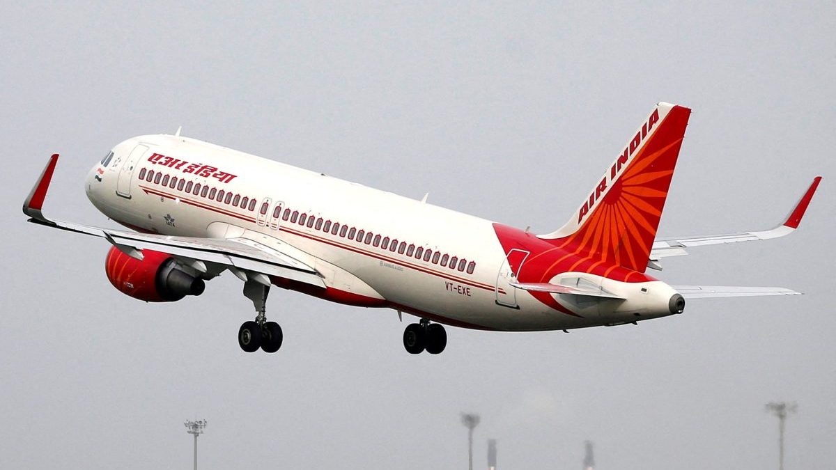 FILE PHOTO: FILE PHOTO: An Air India Airbus A320-200 aircraft takes off from the Sardar Vallabhbhai Patel International Airport in Ahmedabad, India, July 7, 2017. Picture taken July 7, 2017. To match Analysis AIR INDIA-PRIVATISATION/ REUTERS/Amit Dave/File Photo/File Photo
