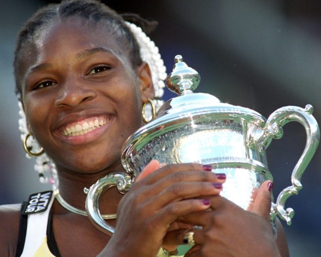 11 Sep 1999: A close up of Serena Williams of the USA as she poses with her trophy after the match between Martina Hingis of Switzerland in the US Open at the USTA National Tennis Center in Flushing Meadows, New York. Williams defeated Hingis 6-3, 7-6 (7-4). Mandatory Credit: Jamie Squire /Allsport