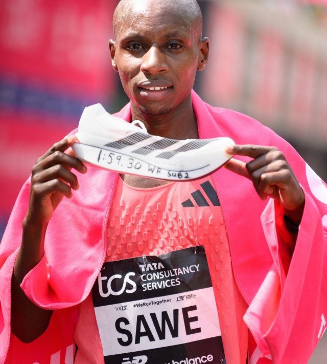 LONDON, ENGLAND - APRIL 26: Sabastian Sawe of Team Kenya celebrates crossing the line and winning with a new World Record time during the Men???s 2026 TCS London Marathon on April 26, 2026 in London, England. (Photo by Karwai Tang/WireImage)