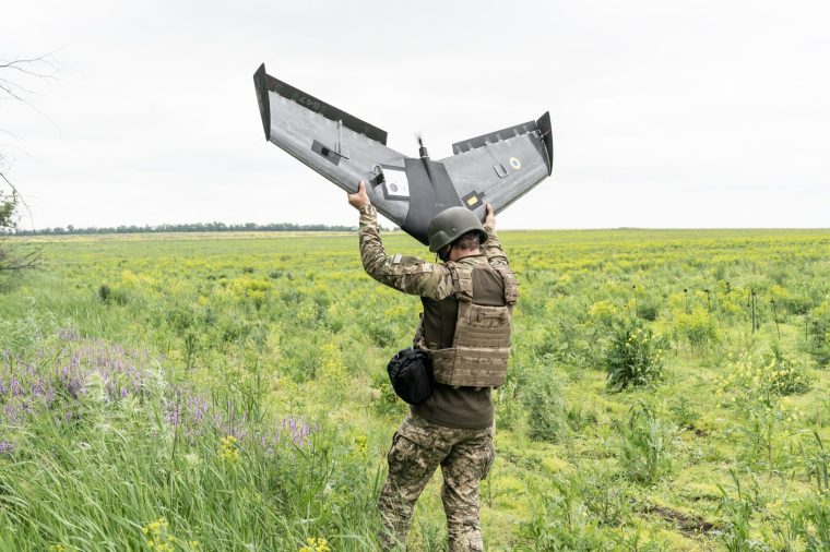 DONETSK REGION, UKRAINE - 2023/05/31: Member of Ukrainian Army Forces handles Aviation Systems of Ukraine Valkyrja drone designed and produced in Ukraine used for reconnaissance of Russian positions in undisclosed location near town of New York Donetsk region. (Photo by Lev Radin/Pacific Press/LightRocket via Getty Images)