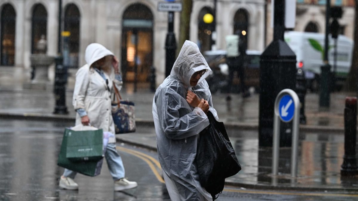 LONDON, UNITED KINGDOM - JUNE 4: Citizens use umbrellas and raincoats to walk through the streets as rainy weather disrupts daily life across London, United Kingdom, on June 4, 2026. (Photo by Rasid Necati Aslim/Anadolu via Getty Images)