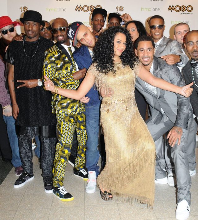 (FILE PHOTO MOBO Founder and CEO, Kanya King CBE passed away on June 3, 2026. GLASGOW, UNITED KINGDOM - OCTOBER 19: Kanya King MBE poses with So Solid Crew at the 18th anniversary MOBO Awards at The Hydro on October 19, 2013 in Glasgow, Scotland. (Photo by Martin Grimes/Getty Images for MOBO)