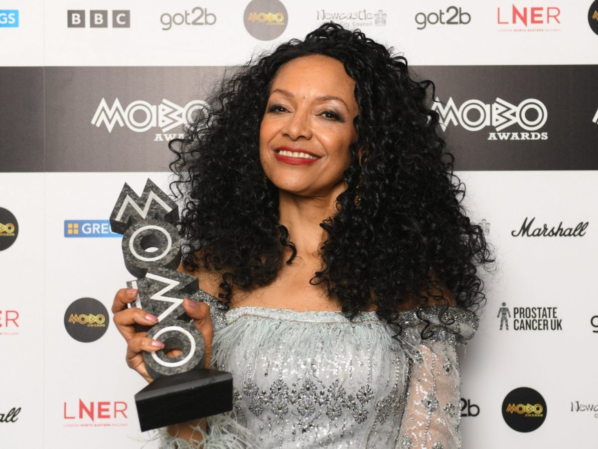 (FILE PHOTO MOBO Founder and CEO, Kanya King CBE passed away on June 3, 2026. NEWCASTLE UPON TYNE, ENGLAND - FEBRUARY 18: Kanya King CBE poses with a special honours award inside the winners room at the MOBO Awards 2025 at the Utilita Arena on February 18, 2025 in Newcastle upon Tyne, England. (Photo by Euan Cherry/Getty Images)