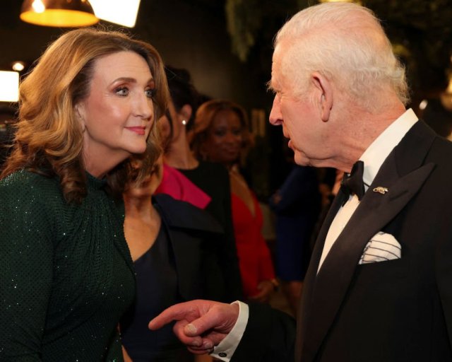 LONDON, ENGLAND - NOVEMBER 22: King Charles III speaks with Victoria Derbyshire after the Royal Variety Performance at the Royal Albert Hall on November 22, 2024. (Photo by Hollie Adams - Pool/Getty Images)
