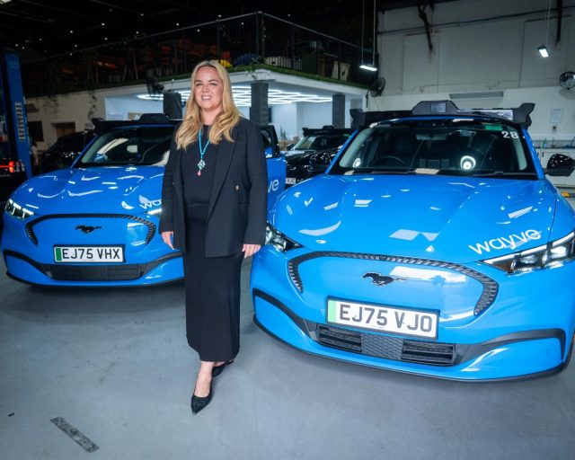 EMBARGOED TO 1200 MONDAY JUNE 8 Annie Duvnjak, Uber's Head of Global Mobility Autonomous Operations poses in front of Wayve vehicles at Wayve Headquarters in north London, ahead of the launch of their taxi service in London, in partnership with ride-hailing platform Uber. The company's technology uses artificial intelligence models which learn how to drive using video content, driving data and recognising patterns. Picture date: Friday June 5, 2026. PA Photo. Photo credit should read: James Manning/PA Wire