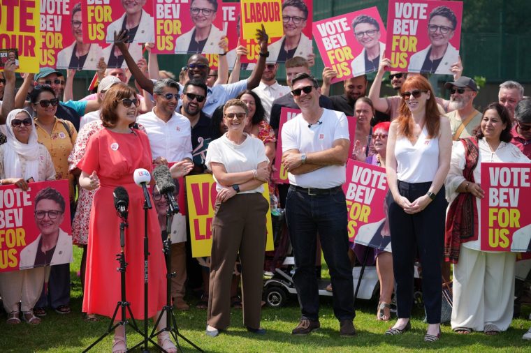 MANCHESTER, ENGLAND - JUNE 26: (L-R) Deputy Leader of the Labour Party Lucy Powell speaks as leader of Manchester City Council, Bev Craig, is presented as Labour???s candidate for Greater Manchester Mayor, alongside MP's Andy Burnham and Angela Rayner, at Radcliffe Football Club on June 26, 2026 in Manchester, England. The election for a new mayor will be held on July 30 after Andy Burnham was elected as MP for Makerfield. (Photo by Christopher Furlong/Getty Images)