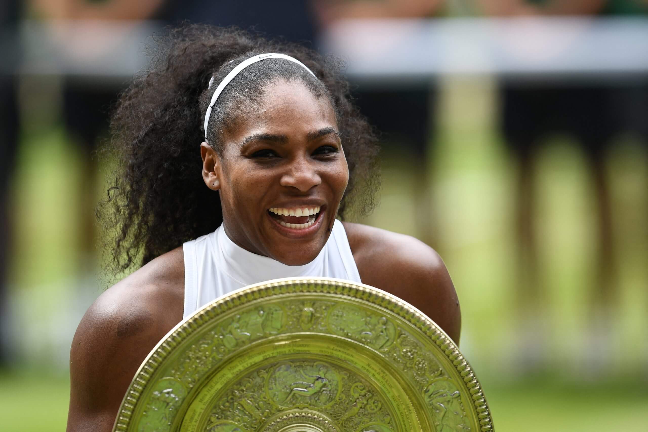 Serena Williams with the Rosewater Dish, the trophy awarded to the Wimbledon women's singles champion.