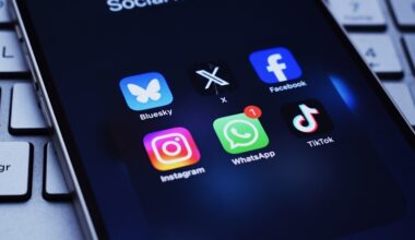 A smartphone screen shows logos for a number of social media apps, including Instagram, X and TikTok.