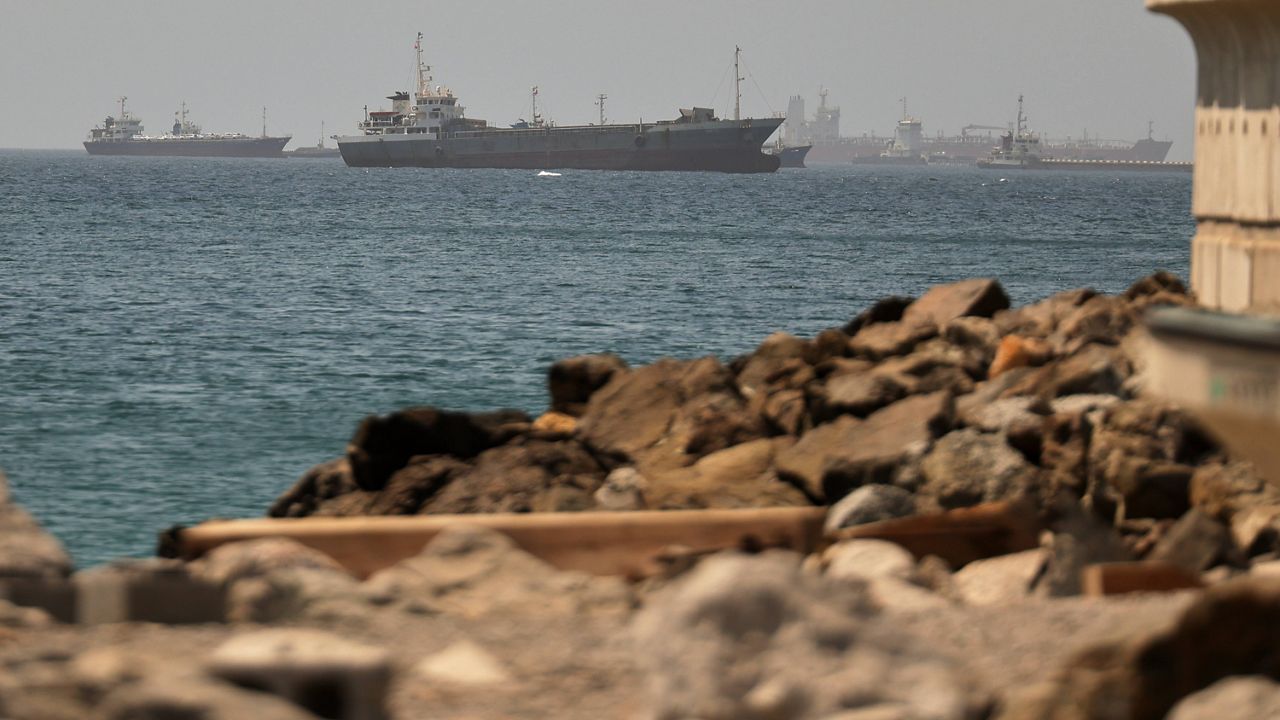 Tankers and cargo vessels are seen in the Gulf of Oman, along shipping routes linking the Strait of Hormuz and the Arabian Sea, Tuesday, June 16, 2026. (AP Photo)