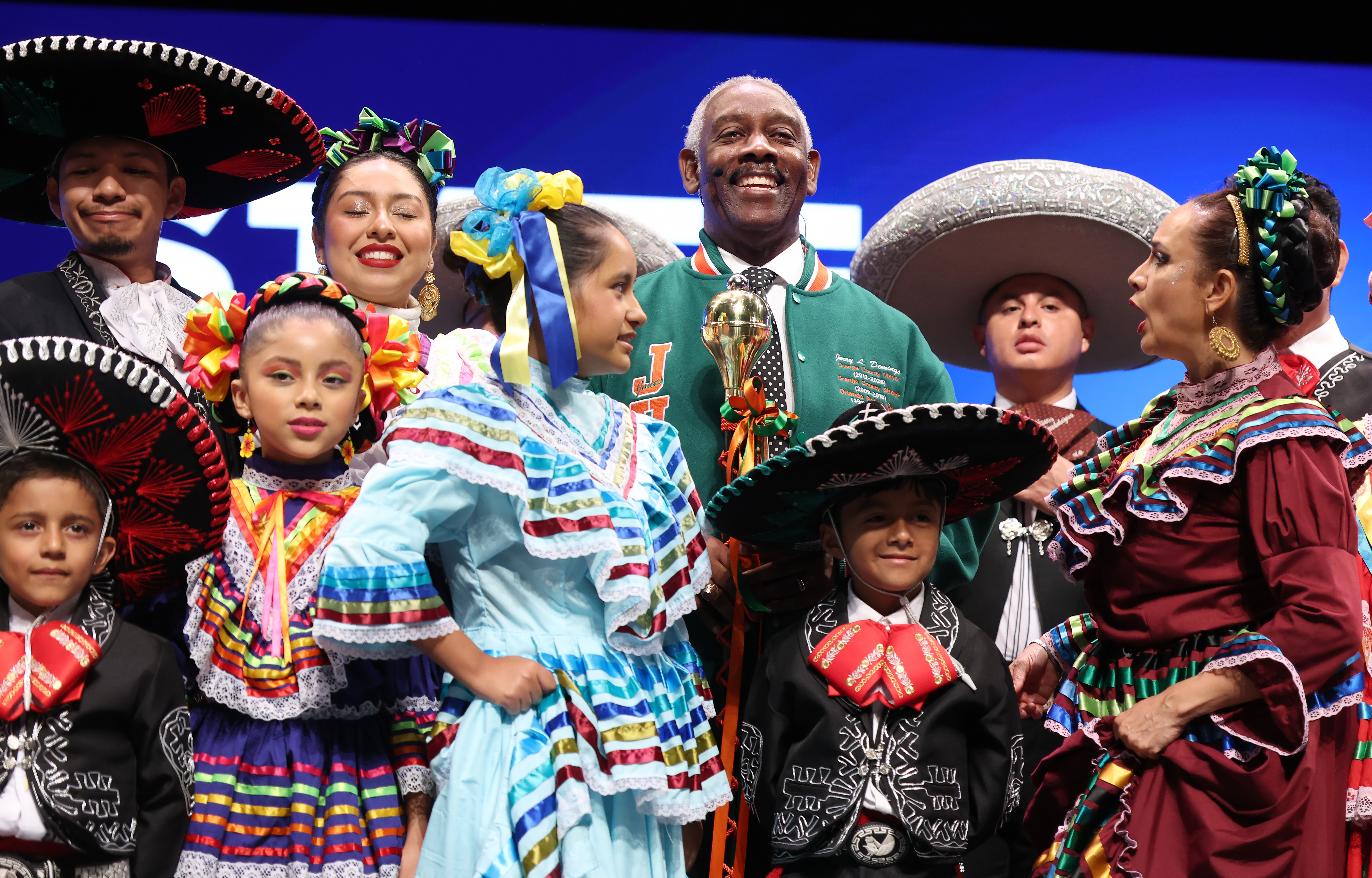 Orange County Mayor Jerry Demings poses with members of Mexico...
