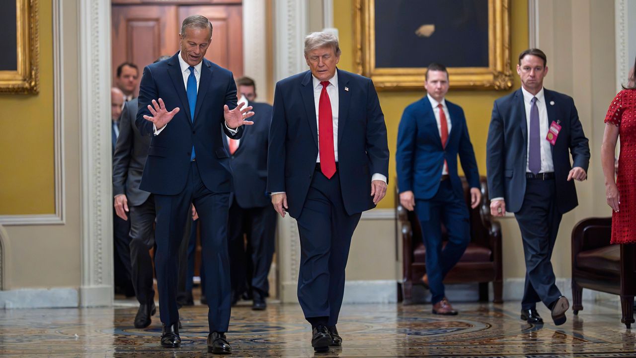 President Donald Trump, escorted by Senate Majority Leader John Thune, R-S.D., heads to a meeting with Senate Republicans at the Capitol in Washington, Wednesday, June 24, 2026. (AP Photo/J. Scott Applewhite)