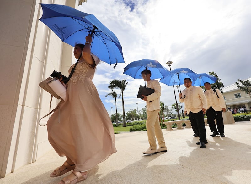 Choir members walk into the  Bacolod Philippines Temple for the dedication in Bacolod City, Philippines, on Sunday, May 31, 2026.