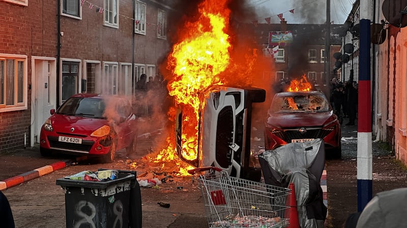 Vehicles were set on fire by protesters on Lendrick Street in Belfast, as disorder flared in response to Monday night’s stabbing attack in the city