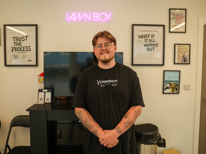 Danny Jones in his barber shop in Holyhead. Photograph: Enda O'Dowd