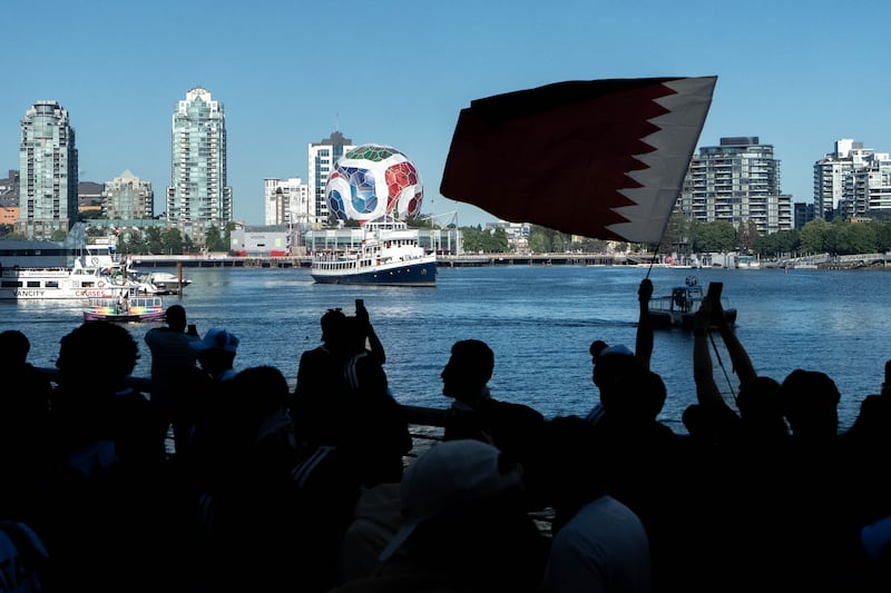 Qatar fans march