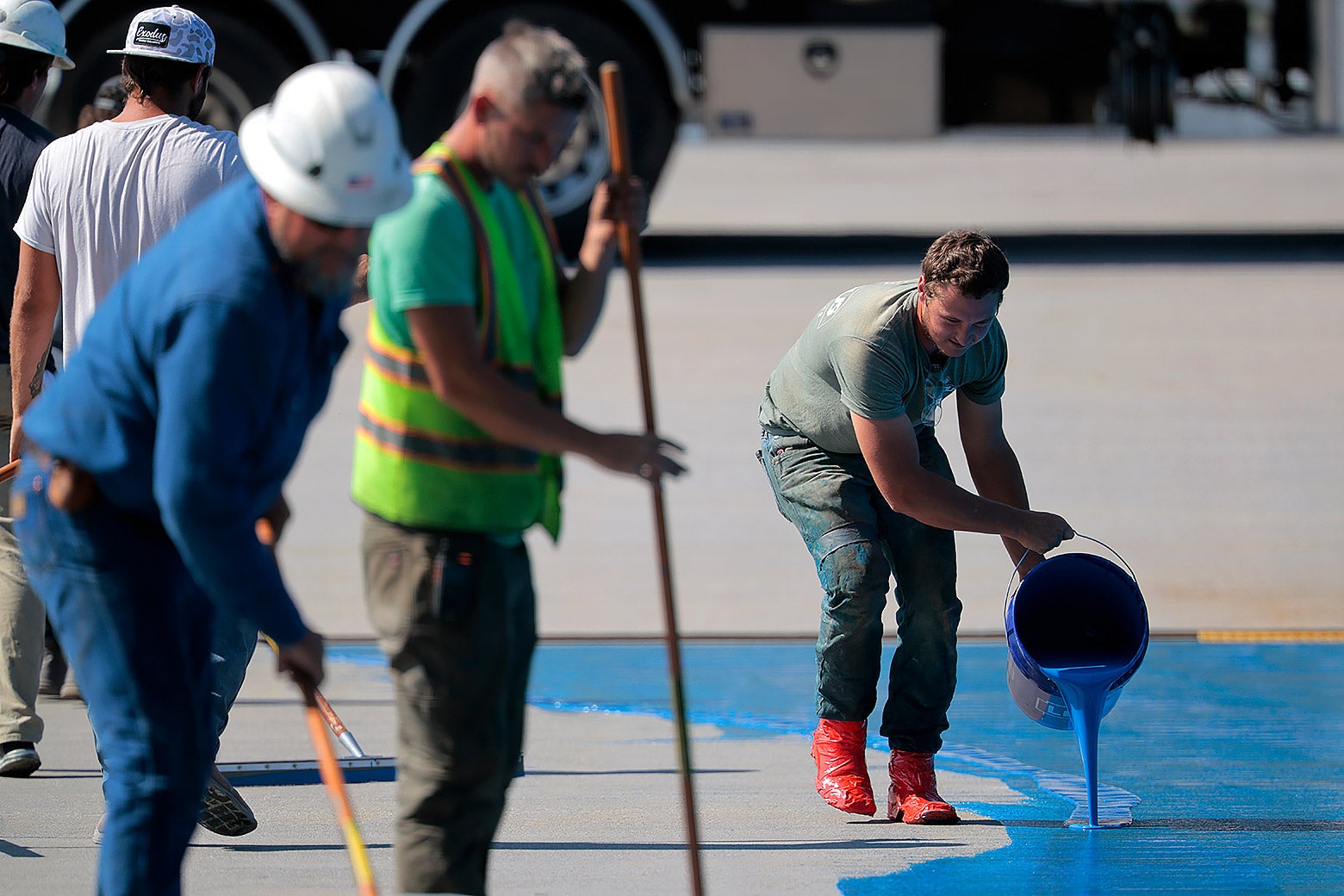 Painting the pool "American flag blue."