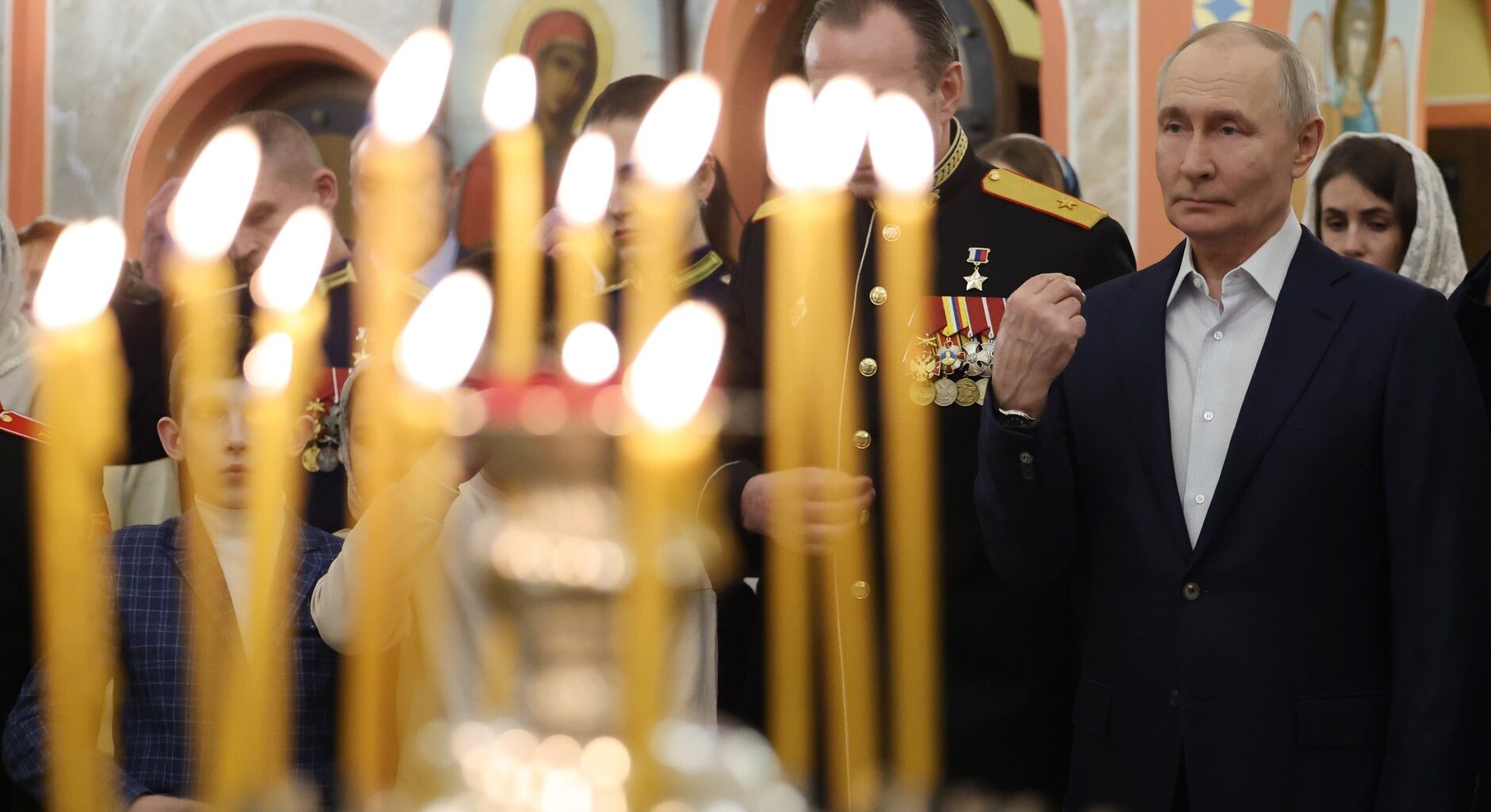 Russian president Vladimir Putin at a Russian Orthodox Christmas service at the Church of the Great Martyr St George the Victorious in Moscow on 7 January <a target="_blank">(Photo: Kremlin)</a>