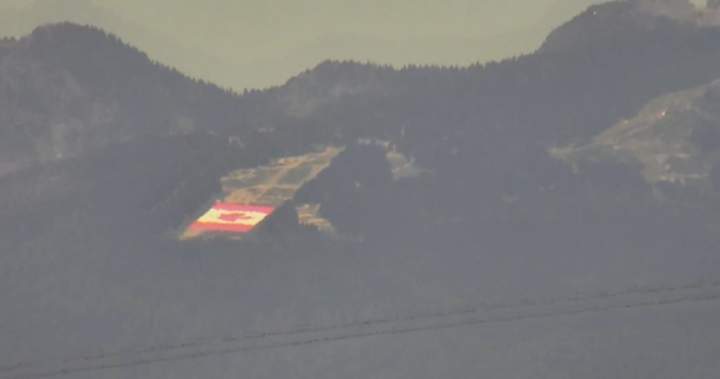 Giant Canadian flag seen on Grouse Mountain, but mystery surrounds it - BC - Global News