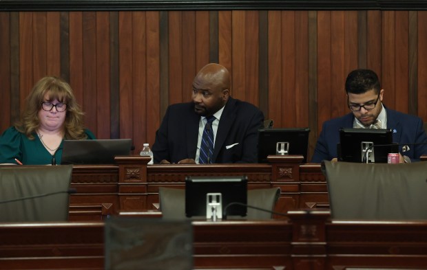 State Sen. Elgie Sims, center, answers questions from fellow Sen. Chapin Rose as the appropriations committee holds a hearing to discuss the budget during the spring legislative session at the State Capitol, May 31, 2026, in Springfield. (John J. Kim/Chicago Tribune)