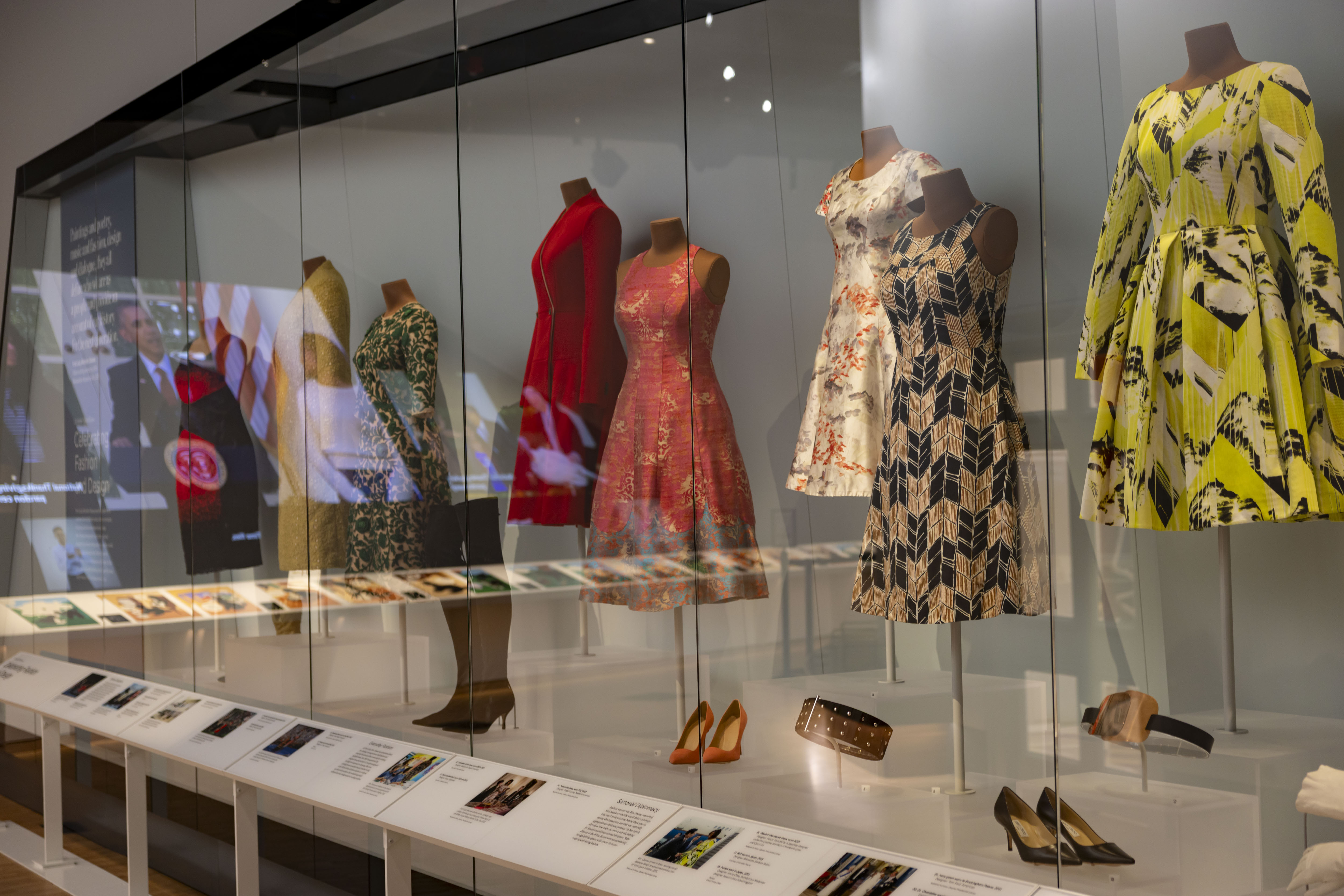 Some of first lady Michelle Obamaâs dresses are displayed in...