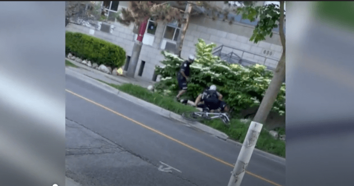 Police tackle Toronto cyclist after he allegedly blew through stop sign - Toronto