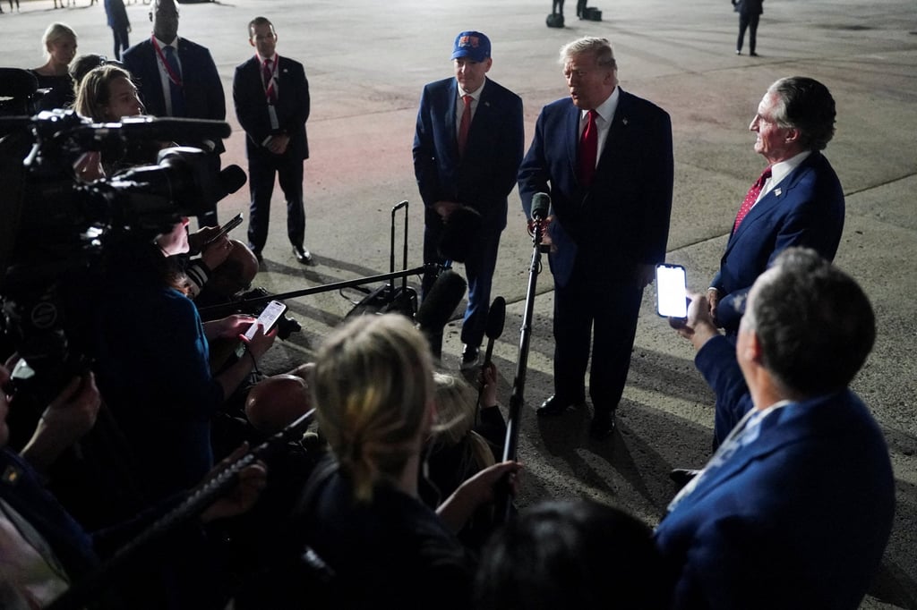 US President Donald Trump speaks to the media, after attending Game 3 of the NBA Finals. Photo: Reuters