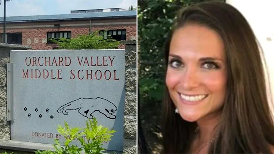 Ashley A. Fisler standing in front of Orchard Middle School