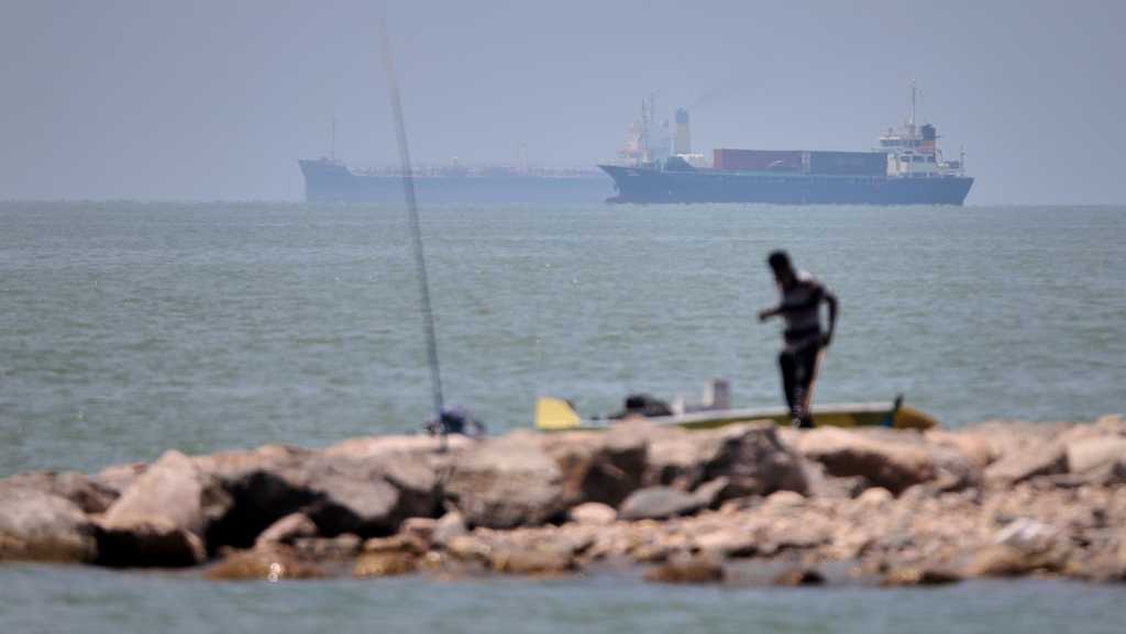 Iranian drones attack Bahrain, a ship is struck after US strikes