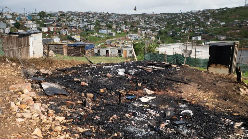 A general view of homes of migrants allegedly destroyed in anti-migrant attacks in KwaNonqaba, Mossel Bay, on June 4, 2026. - Rodger Bosch/AFP/Getty Images