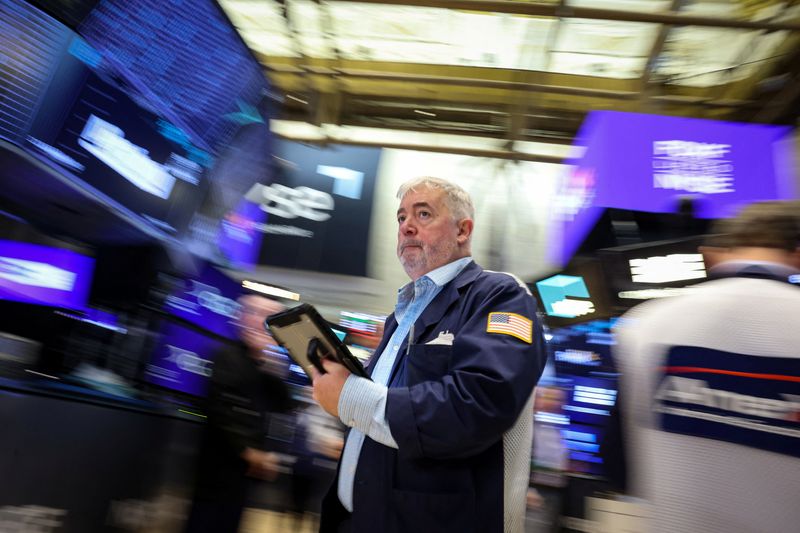 Wall St hovers near record highs as Nvidia, tech gains eclipse Iran war anxiety