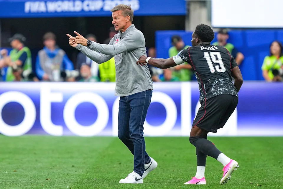 INGLEWOOD, CA - JUNE 28: Canada head coach Jesse Marsch reacts as Alphonso Davies #19 of Canada attempts to pull him back during the FIFA World Cup 2026 Round Of 32 match between South Africa and Canada at Los Angeles Stadium on June 28, 2026 in Inglewood, California. (Photo by Robin Alam/ISI Photos/ISI Photos via Getty Images)