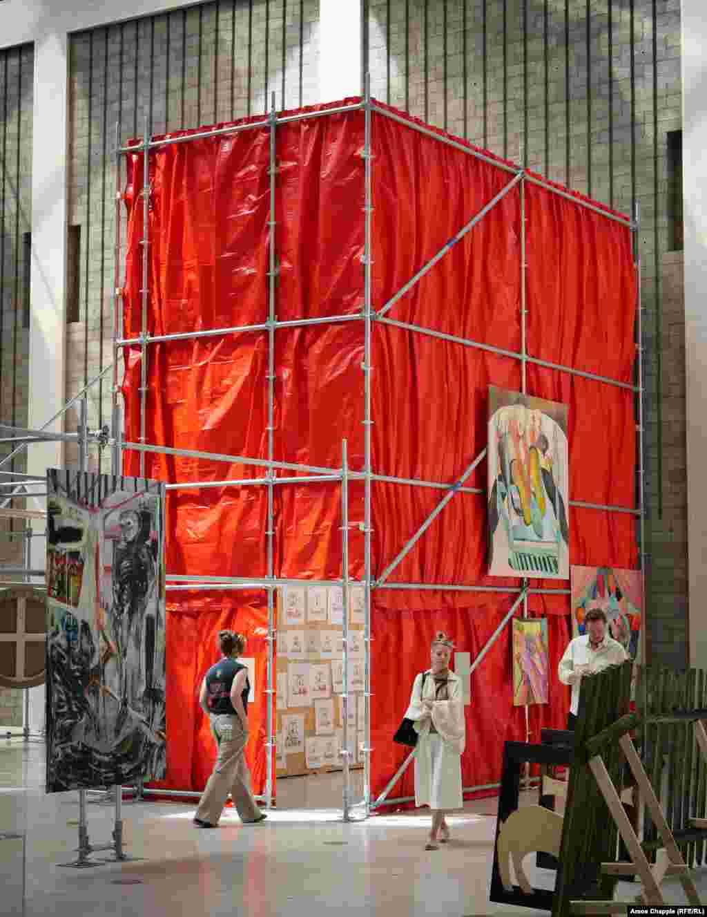 Inside this display in a Prague exhibition hall, the plight of political prisoners in Belarus is being highlighted in an art form usually associated with traditional Slavic clothing.<br>