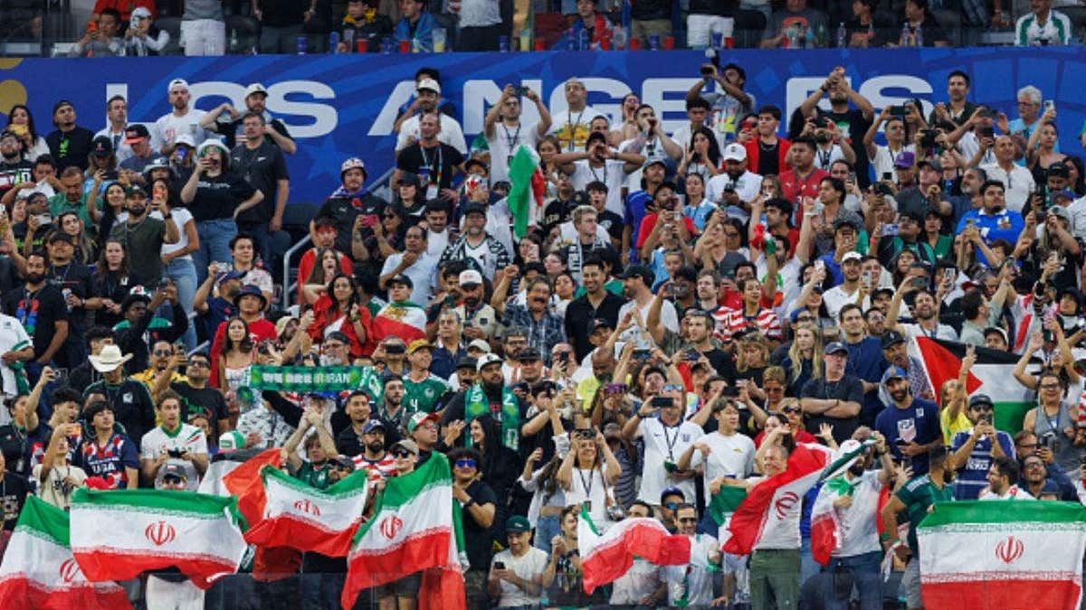 Iran fans celebrate wildly as their team battles New Zealand to a World Cup draw (Photo by Liza Rosales/ISI Photos/ISI Photos via Getty Images)