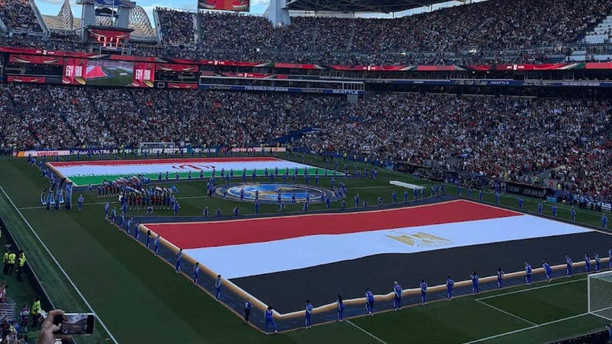 Iran (top) and Egypt (bottom) unfurl flags at Seattle 