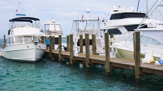 EXUMAS, THE BAHAMAS - JUNE 15: Private luxury yachts on June 15, 2012 in Staniel Cay Marina, The Bahamas.