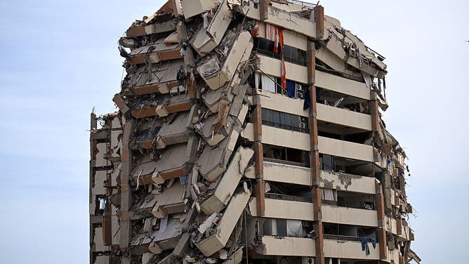 A view shows a heavily damaged apartment building following an earthquake in Catia La Mar, La Guaira state, about 30 km northwest of Caracas, on June 25, 2026.