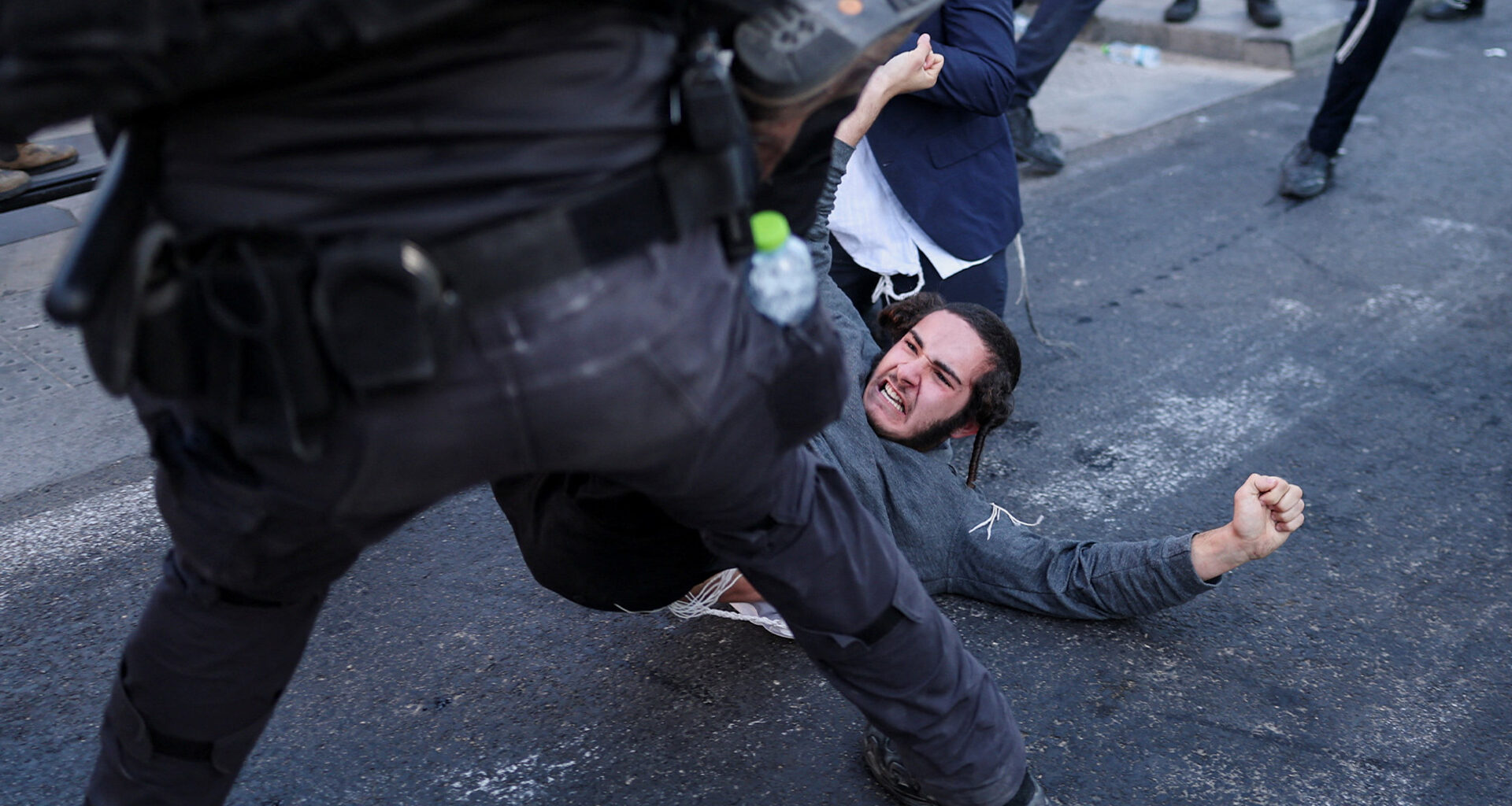 Ultra-Orthodox protesters clash with Israeli police over army draft | Protests